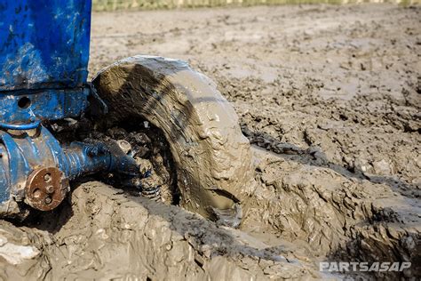 mini digger stuck in mud|getting tractor unstuck from mud.